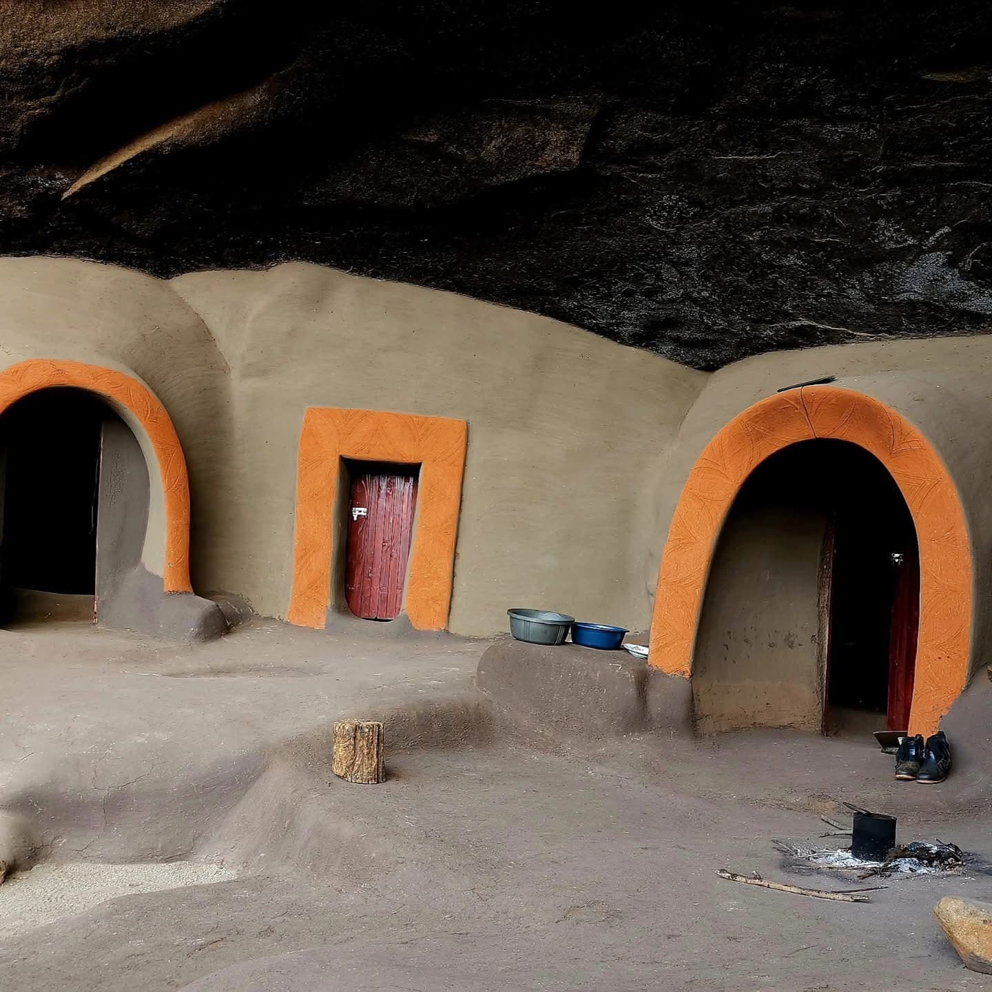Detail of the mud-brick and stone construction of a dwelling at Kome Caves