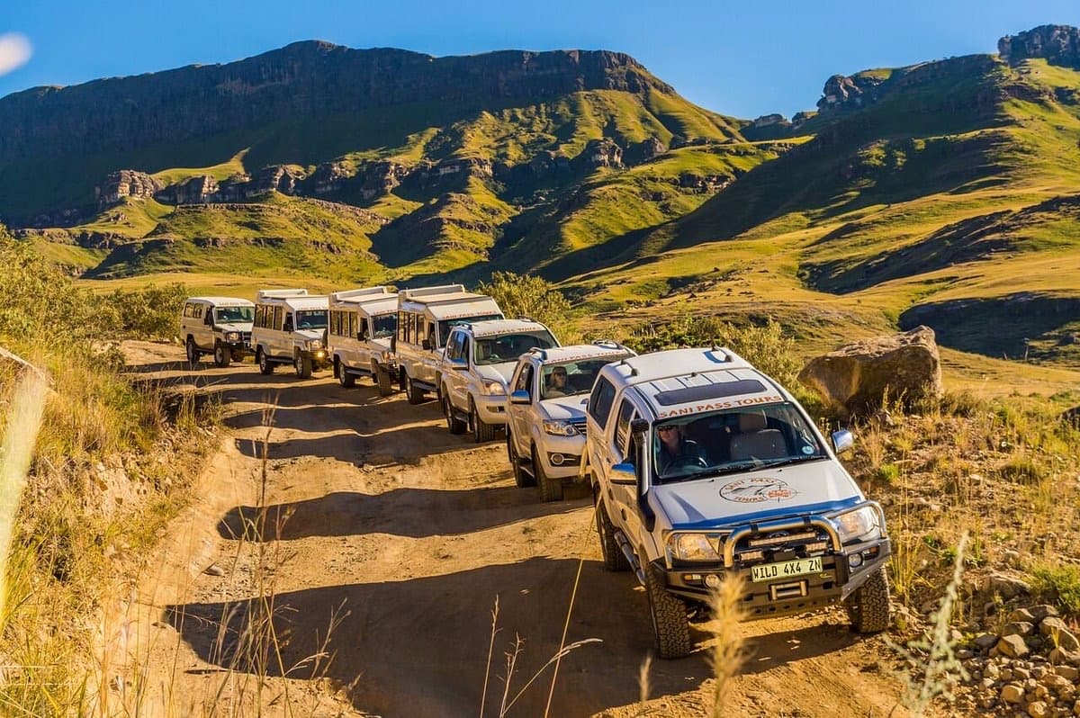 4x4 vehicle climbing a gravel mountain pass in Lesotho